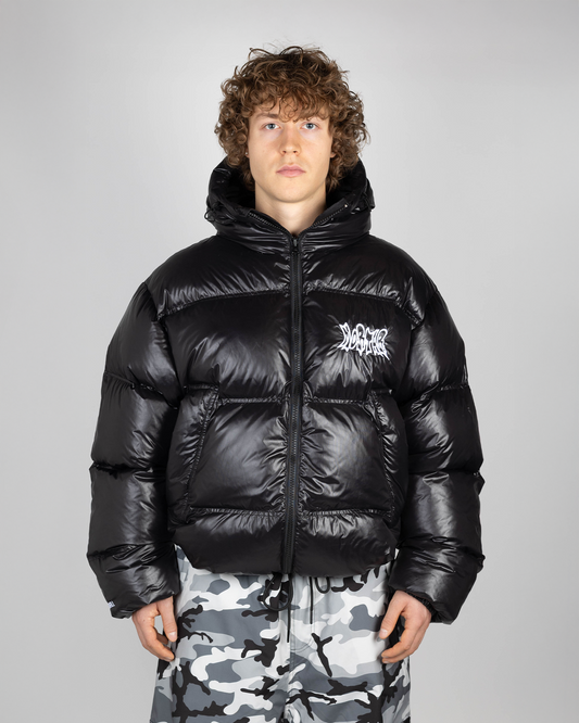Black puffer jacket front view on model (Valtteri is 175cm wearing size XL)