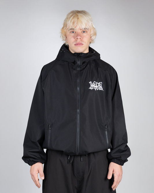 Black snow jacket front view on model (Topias is 180cm wearing size XL)