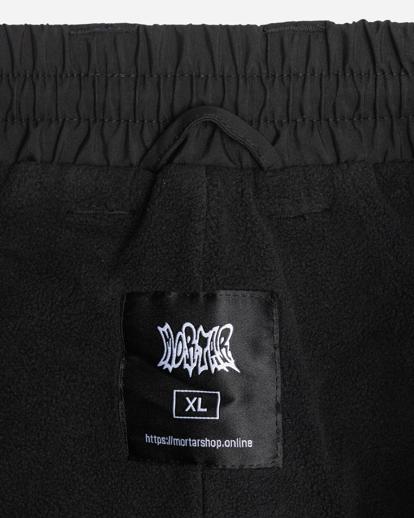Black baggy snowpants fleece lining detail