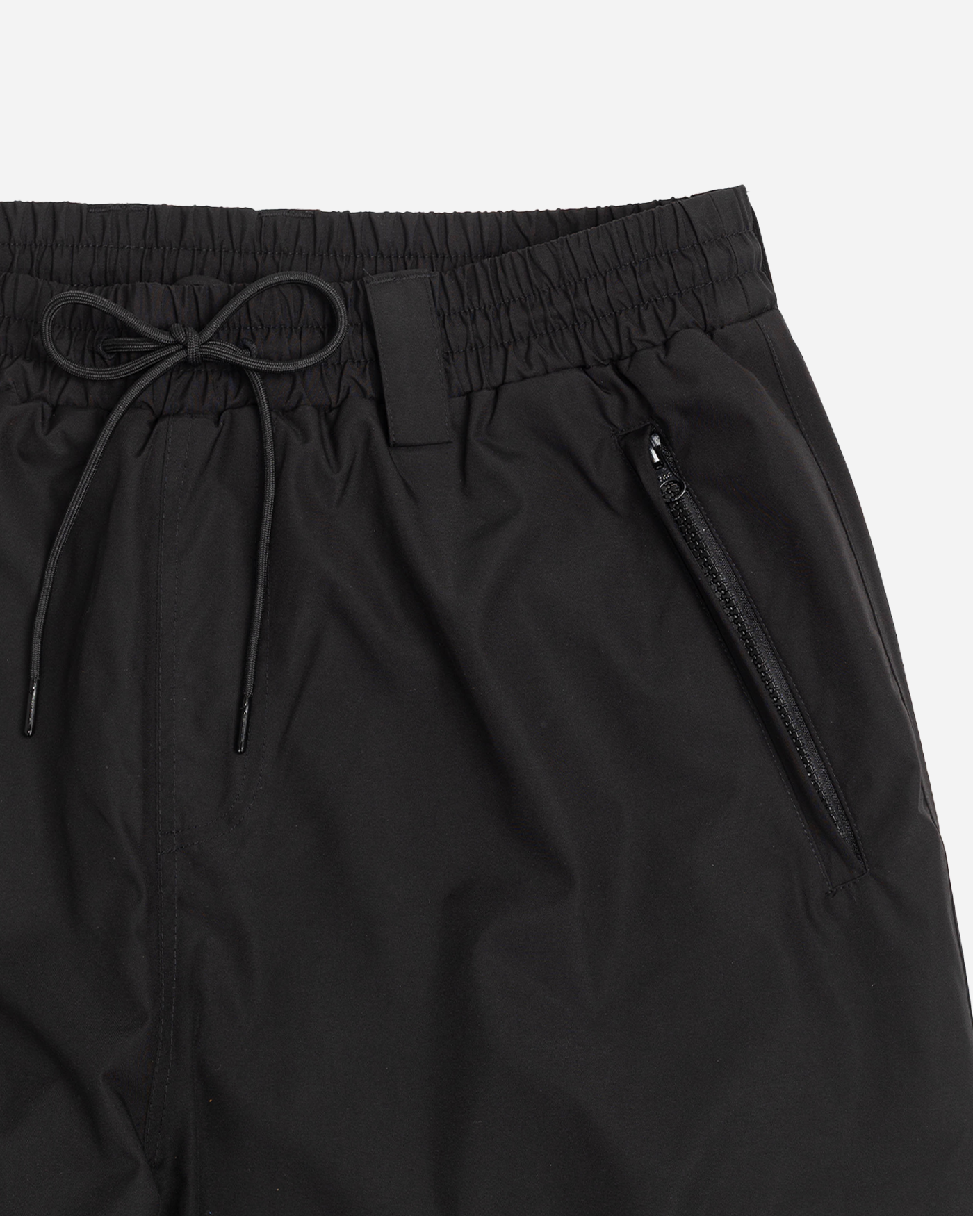 Black baggy snowpants pocket detail