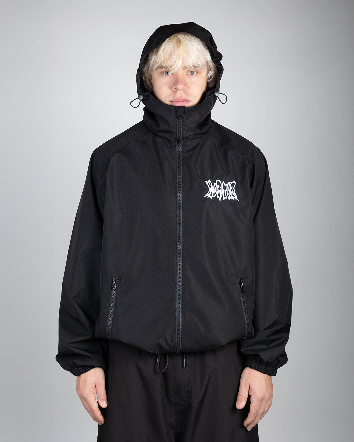 Black snow jacket hooded front view on model