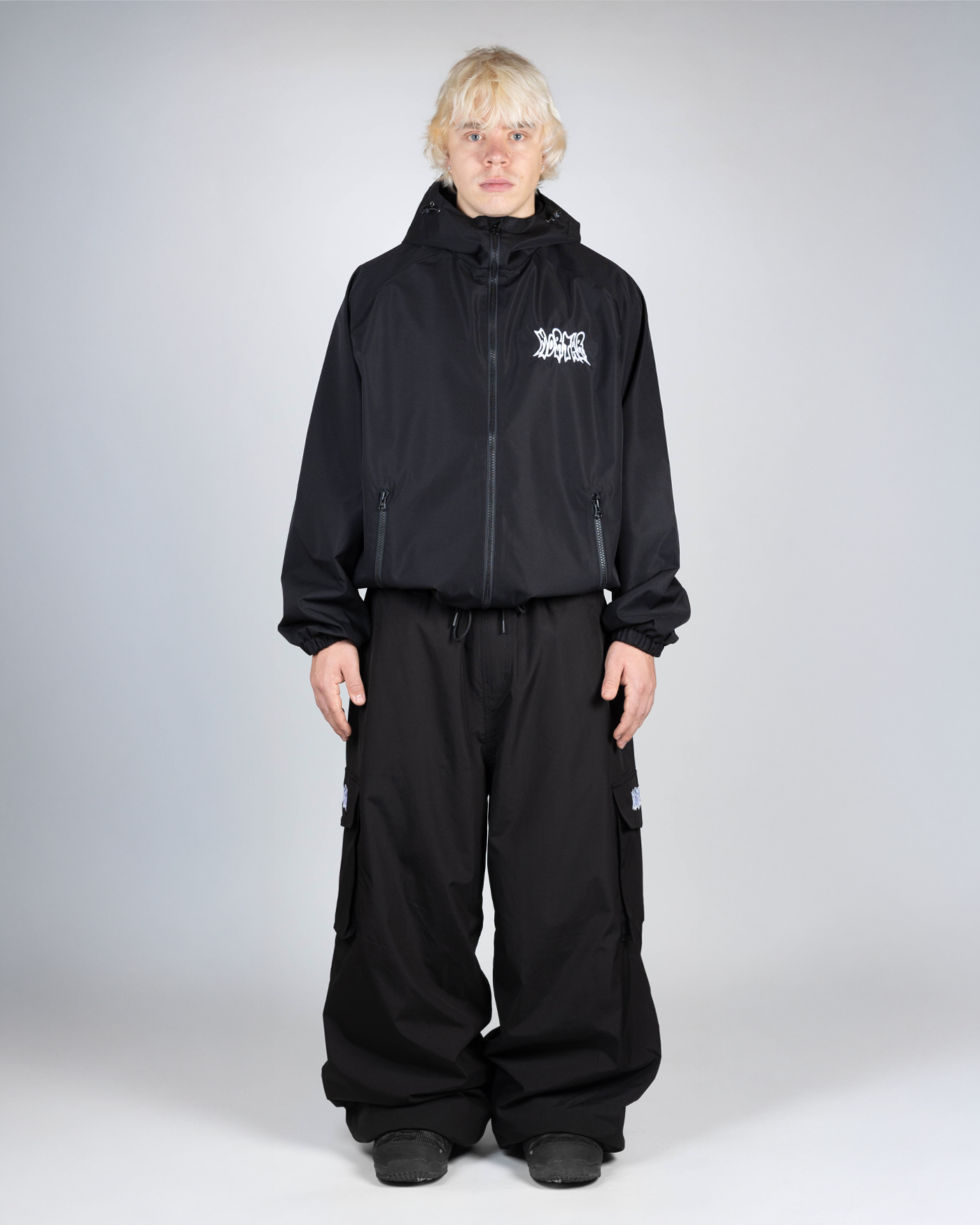 Black snow jacket full front view on a man