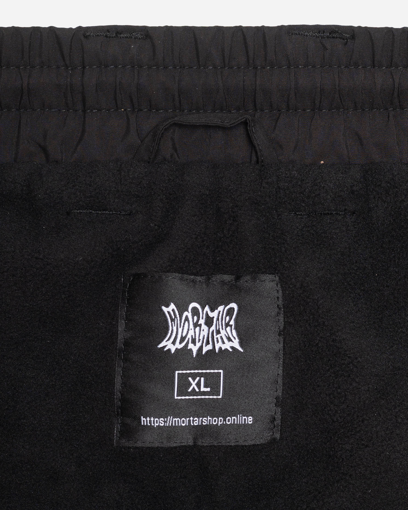 Black stripe baggy snowpants fleece lining detail