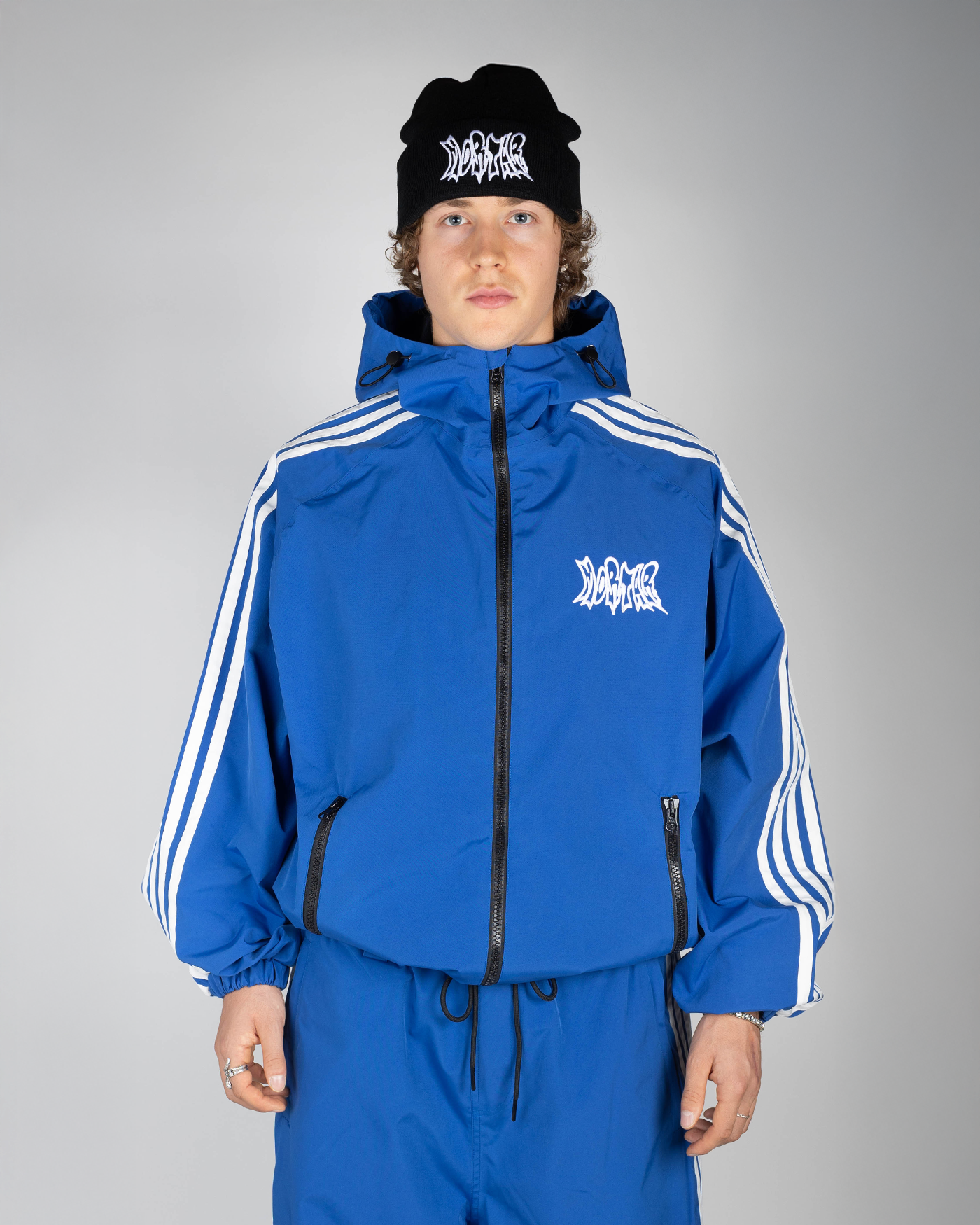 Blue snow jacket front view on model  (Valtteri is 175cm wearing size XL)