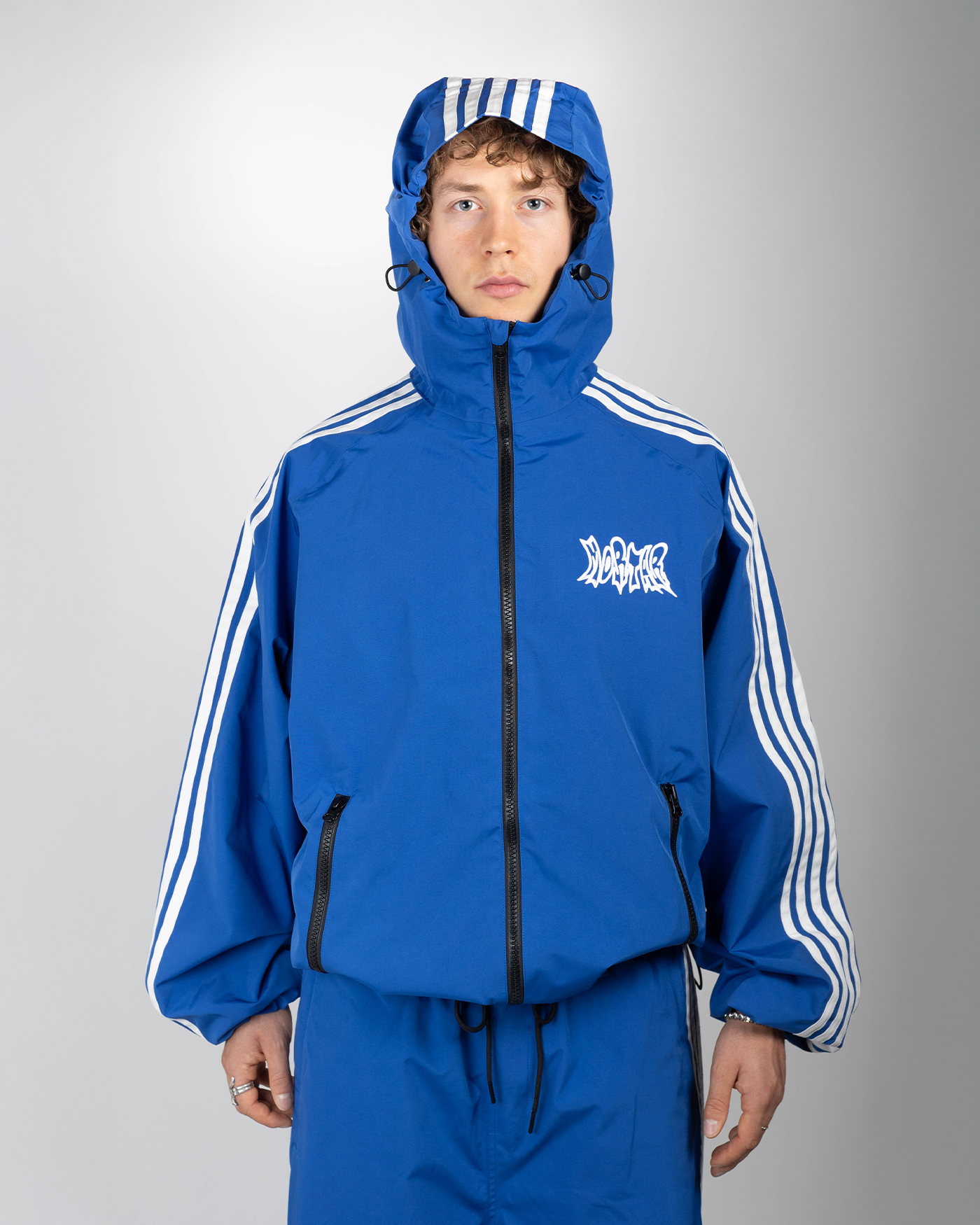Blue stripe snow jacket hooded front view on model