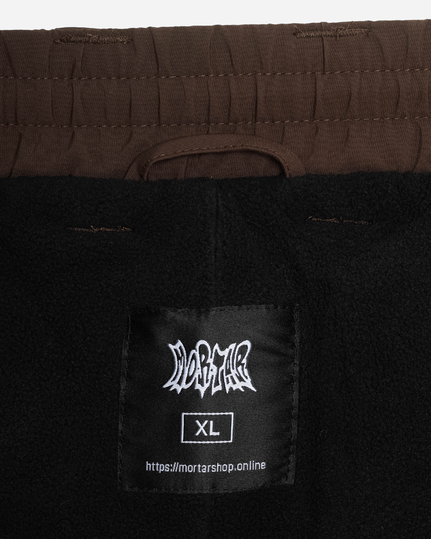 Brown baggy snowpants fleece lining detail