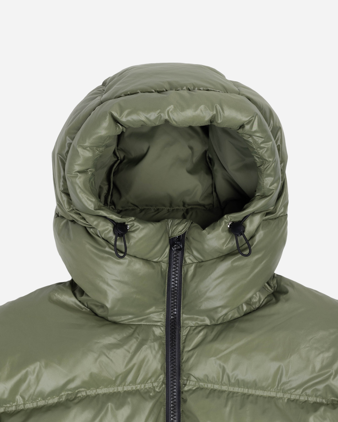 Green puffer jacket hood detail