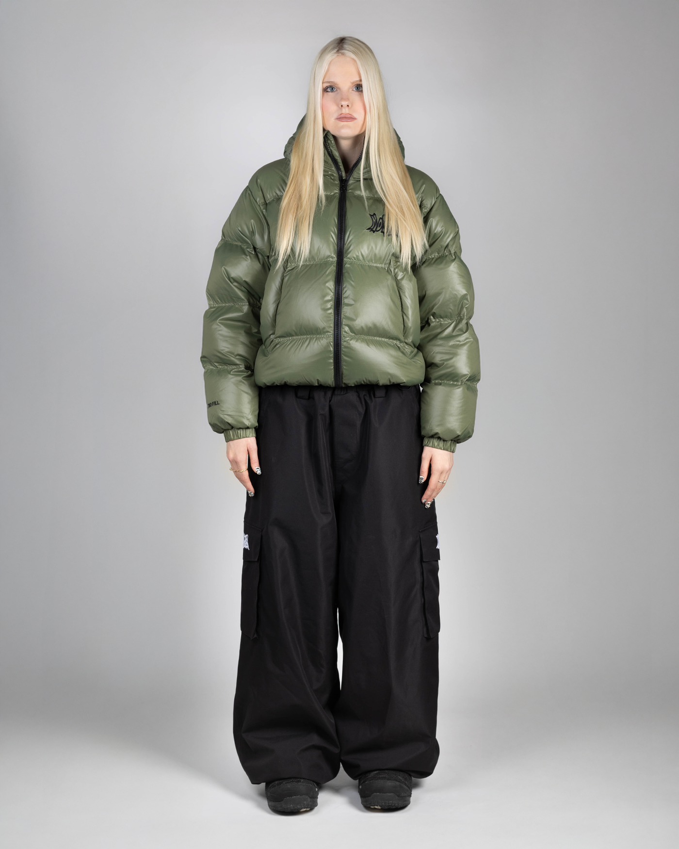 Green puffer front view on woman (Hilla is 175cm wearing size M)