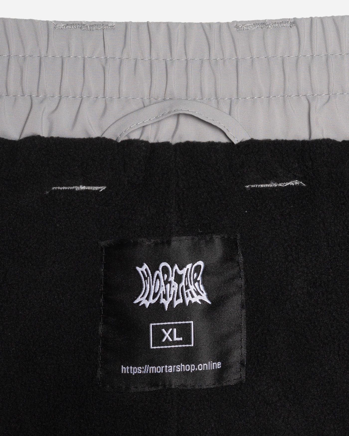 Grey baggy snowpants fleece lining detail