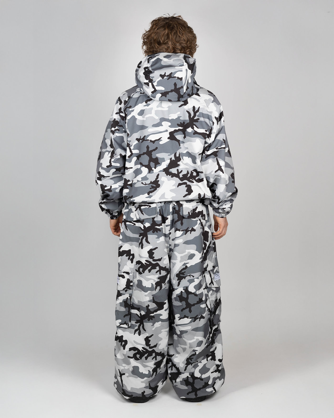 Winter camo snow jacket full back view on a man