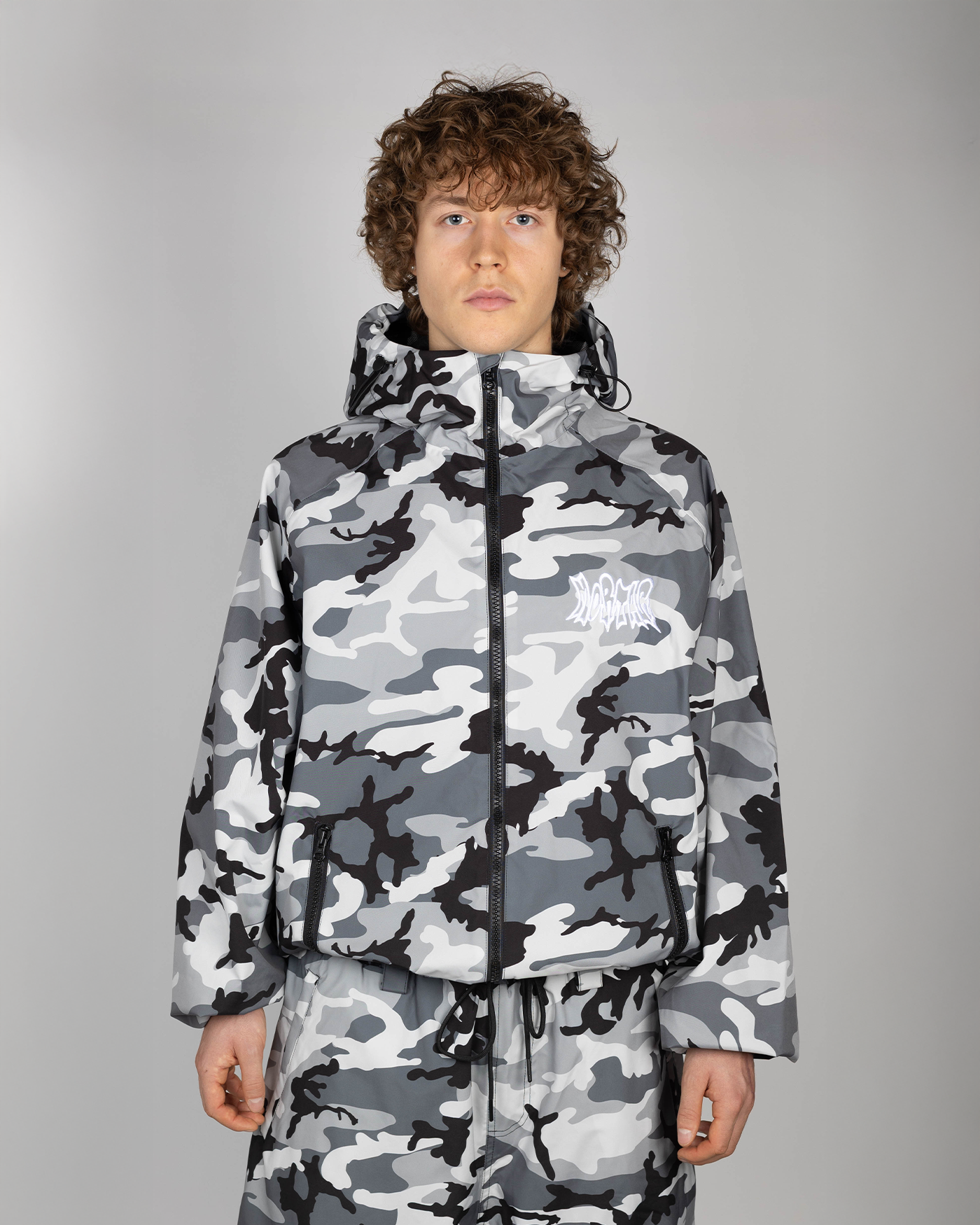 Winter camo snow jacket front view on model (Valtteri is 175cm wearing size XL)